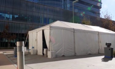 UC San Diego Health tents are setup in parking lots to triage patients. Dr. Christopher Longhurst