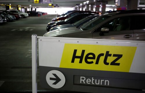 Hertz will pay $168 million to settle 364 claims related to the company falsely reporting rental cars as stolen. Vehicles sit parked at a Hertz Global Holdings Inc. rental location in Charlotte