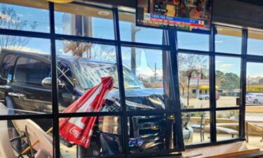 A Chevrolet crashed into a Slim Chickens fast food restaurant on State Line Ave. in Texarkana