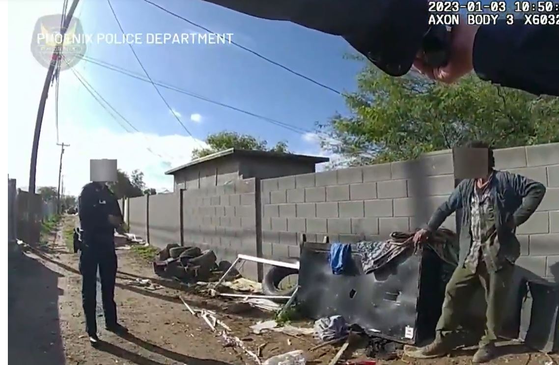 <i>Phoenix Police Department/KTVK</i><br/>New body-cam video from Phoenix police shows an officer shooting a man several times in an alley after he reportedly refused to drop a pair of scissors