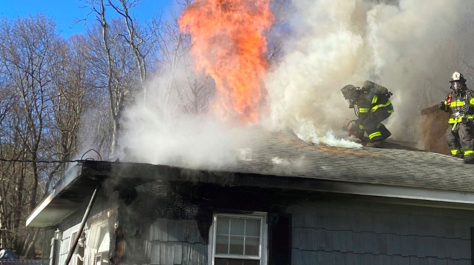 <i>Norwalk Fire Department</i><br/>Norwalk Fire responded to a house fire at 11:59pm on January 8. Firefighters are shown on the roof of the house.