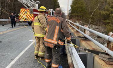 The Torrington Fire Department responded a to a rescue operation for a woman that fell 25 feet from a bridge into a river.