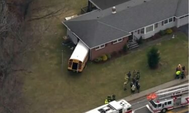 Neighbors watched in horror as the big yellow bus careened into the house.