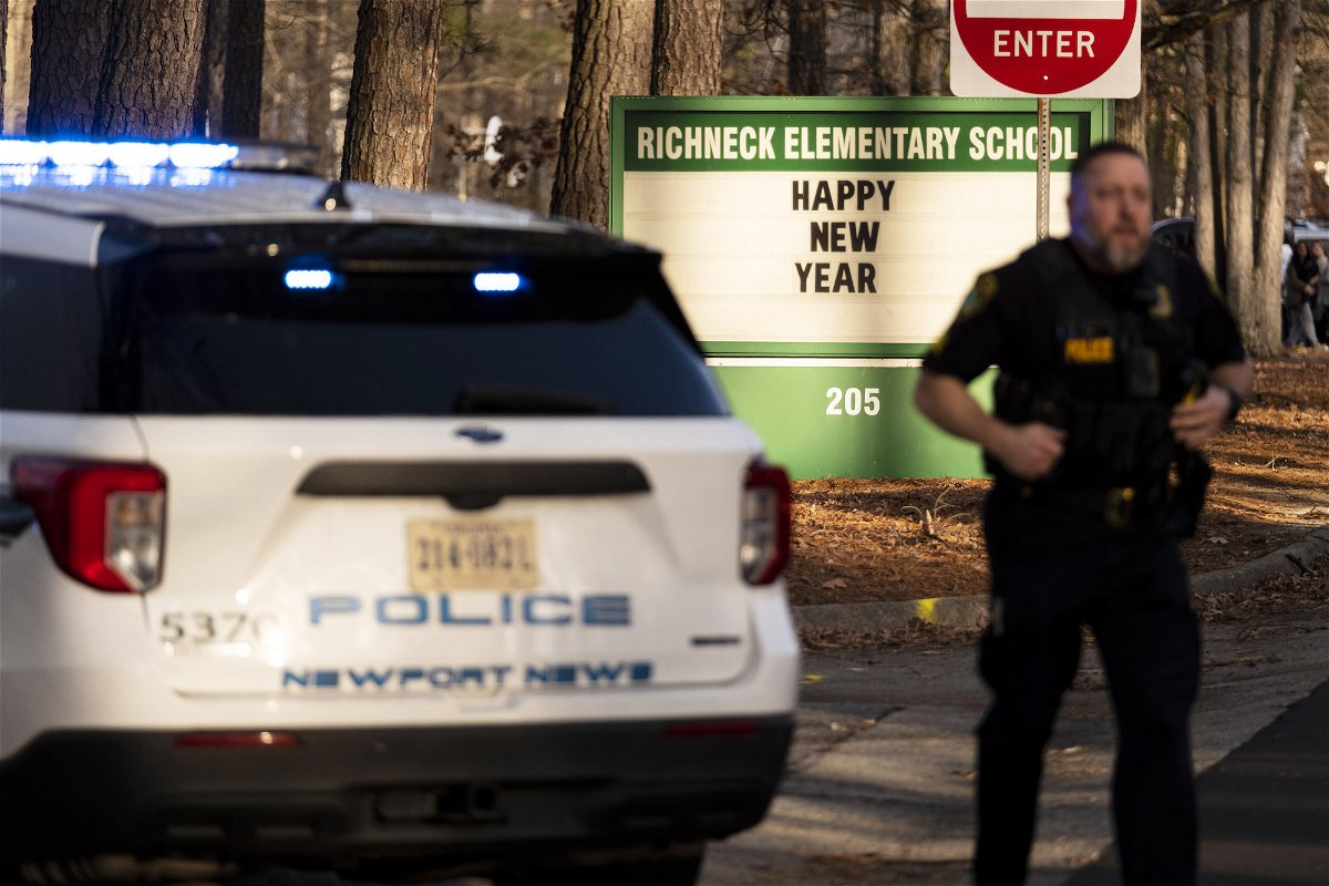 <i>Billy Schuerman/The Virginian-Pilot/AP</i><br/>Police respond to Richneck Elementary School in Newport News