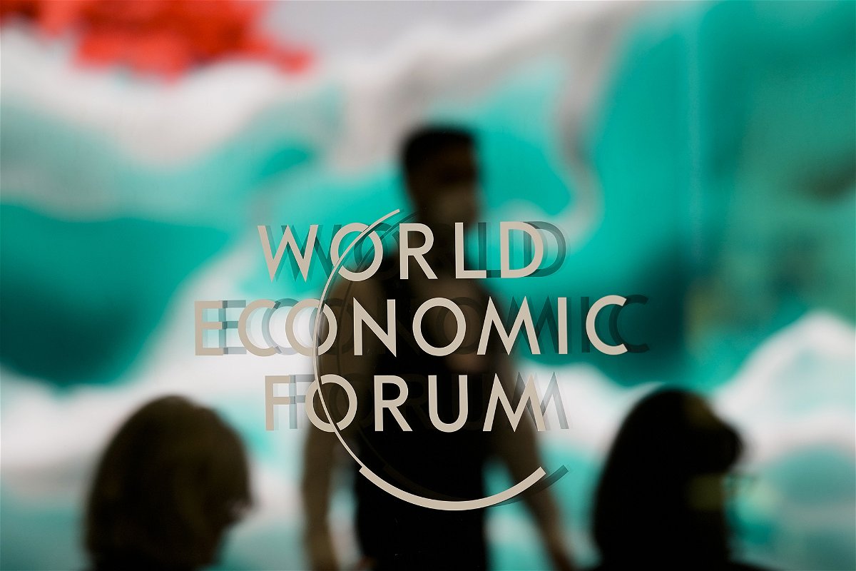 <i>Markus Schreiber/AP</i><br/>CEOs at Davos are using ChatGPT to write work emails. The logo of the World Economic Forum is displayed on a window in Davos