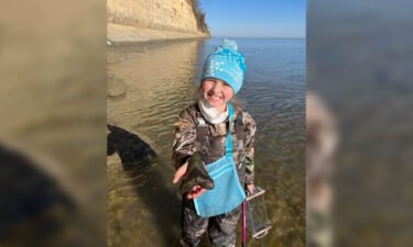9-year-old Molly Sampson discovered a massive 5-inch megalodon tooth on Christmas at Maryland's Calvert Cliffs State Park.