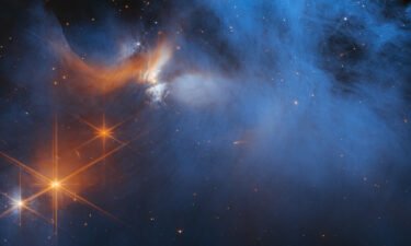 Stars shine through the hazy material of the Chameleon I dark molecular cloud