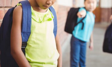 Parents should talk with their kids about the importance of reporting bullying behavior to  school staff.