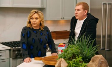Julie Chrisley (left) and Todd Chrisley are pictured here in an episode of "Chrisley Knows Best."
