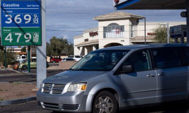 Prices fell in December as inflation continues to moderate. Pictured is a Chevron gas station on January 4
