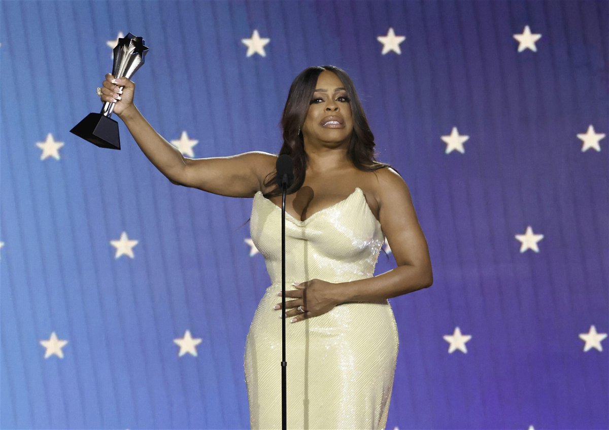 <i>Kevin Winter/Getty Images</i><br/>Niecy Nash-Betts accepts the best supporting actress in a limited series award at the Critics' Choice Awards on January 15.