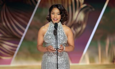 Angela Bassett accepts the best supporting actress in a motion picture Golden Globe award for 'Black Panther: Wakanda Forever' on January 10.