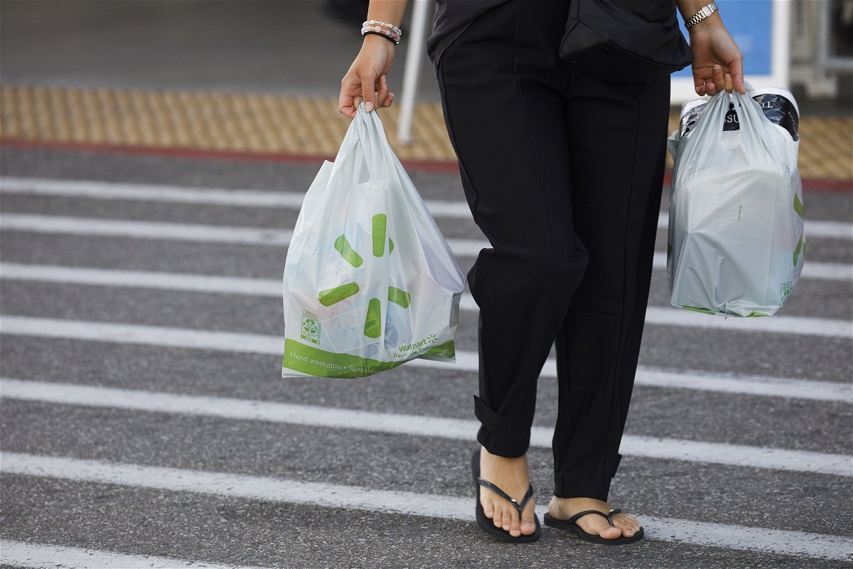 <i>Patrick T. Fallon/Bloomberg/Getty Images</i><br/>Walmart will eliminate single-use paper and plastic carryout bags from stores in New York