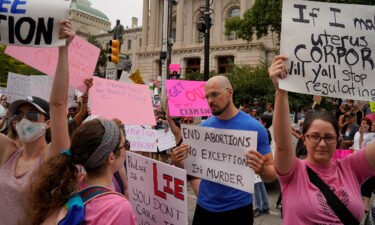 Women living in states that restrict or ban abortion face greater economic insecurity than those living in states where they have access. Activists protest outside the Indiana Statehouse in Indianapolis