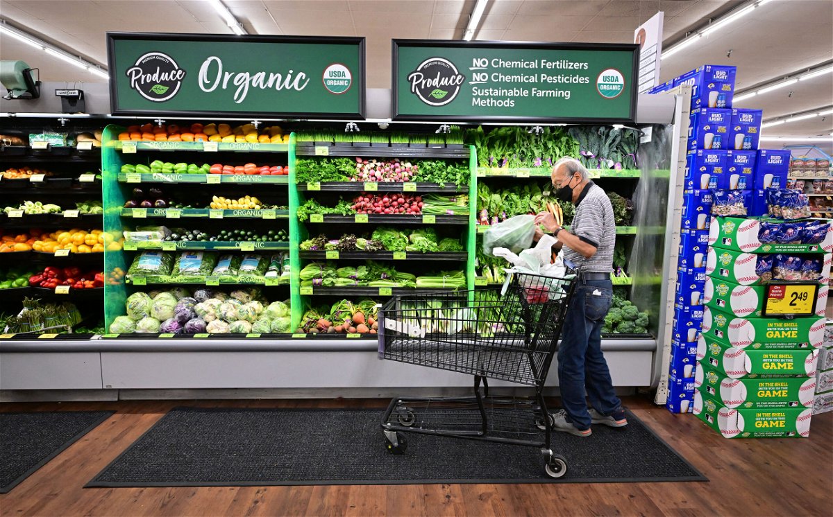 <i>Frederic J. Brown/AFP/Getty Images</i><br/>A shopper looks at organic produce at a supermarket in Montebello