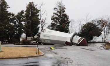 Damage is seen outside a hotel in Decatur