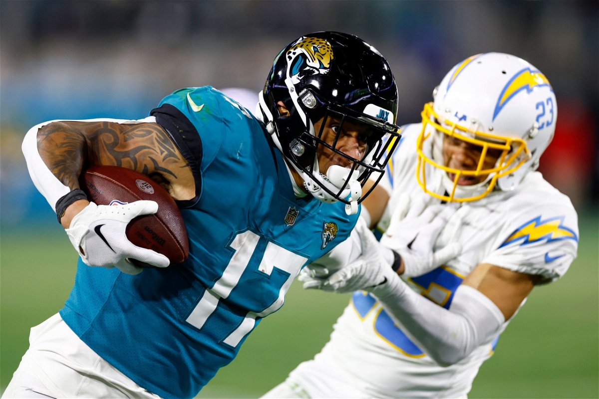 <i>Douglas P. DeFelice/Getty Images</i><br/>Evan Engram of the Jacksonville Jaguars carries the ball against the Los Angeles Chargers during the second half of the game in the AFC Wild Card playoff game on January 14.