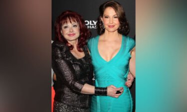 Ashley Judd says she needed therapy to cope with the recent media coverage of her mother's death. Naomi Judd (L)  and Ashley Judd are pictured here in 2013 in Los Angeles.