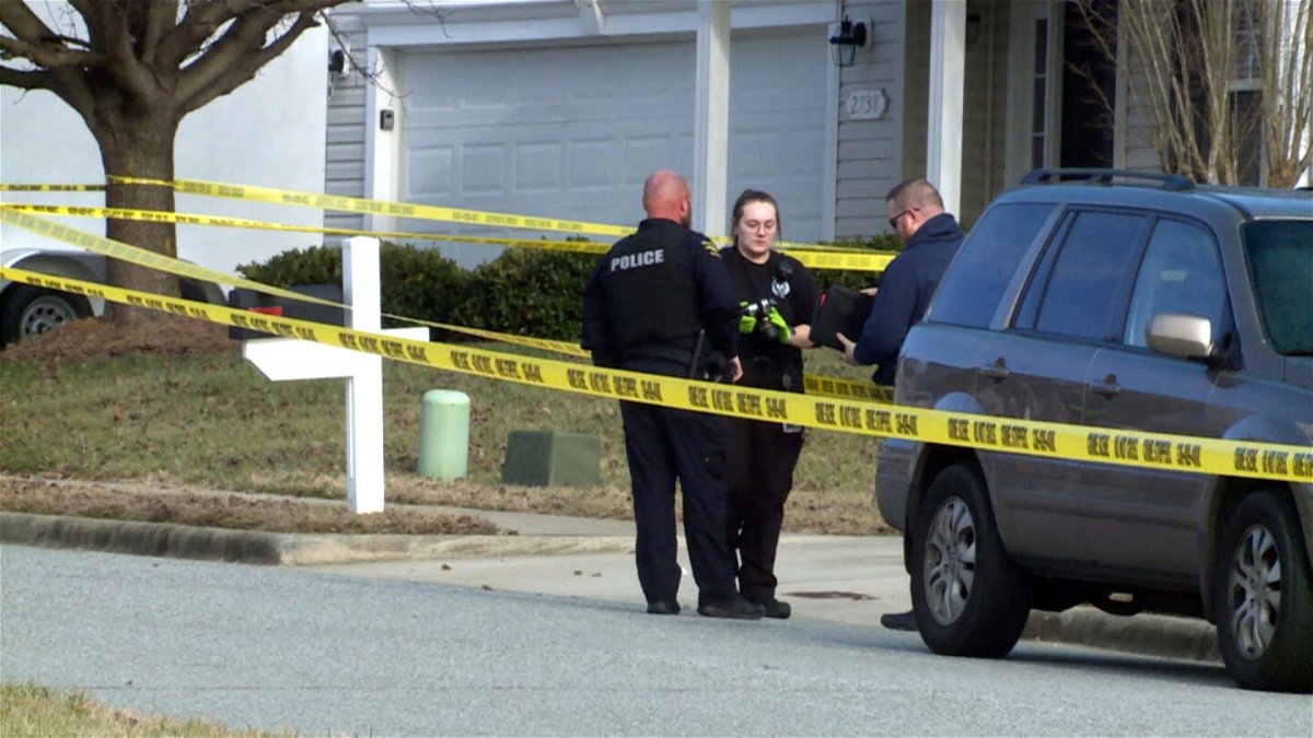 <i>WXII</i><br/>Police work at the scene of a murder-suicide in High Point