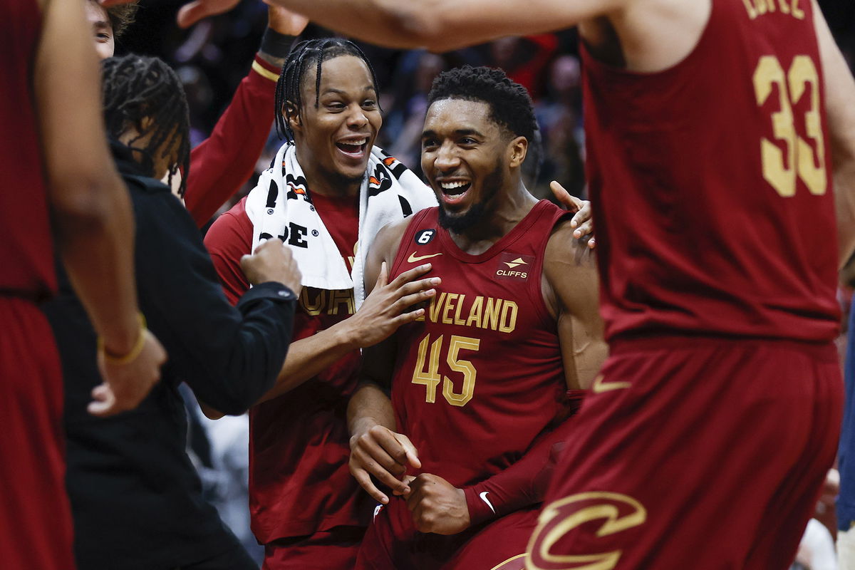 <i>Ron Schwane/AP</i><br/>Cleveland Cavaliers guard Donovan Mitchell (45) celebrates with teammates after making a basket to tie an NBA basketball game during the second half against the Chicago Bulls