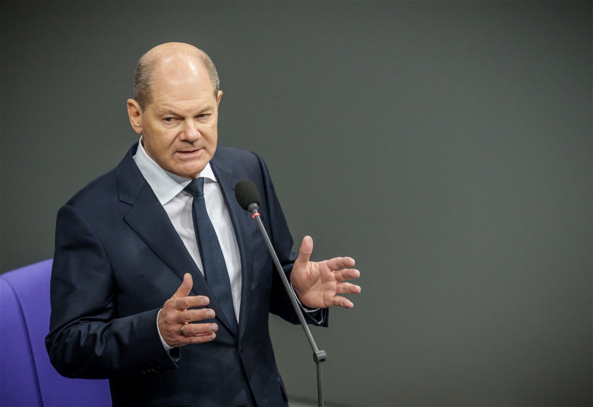 <i>Michael Kappeler/picture alliance/Getty Images</i><br/>Chancellor Olaf Scholz speaks in Germany's Bundestag after announcing that his government would deliver Leopard battle tanks to Ukraine.