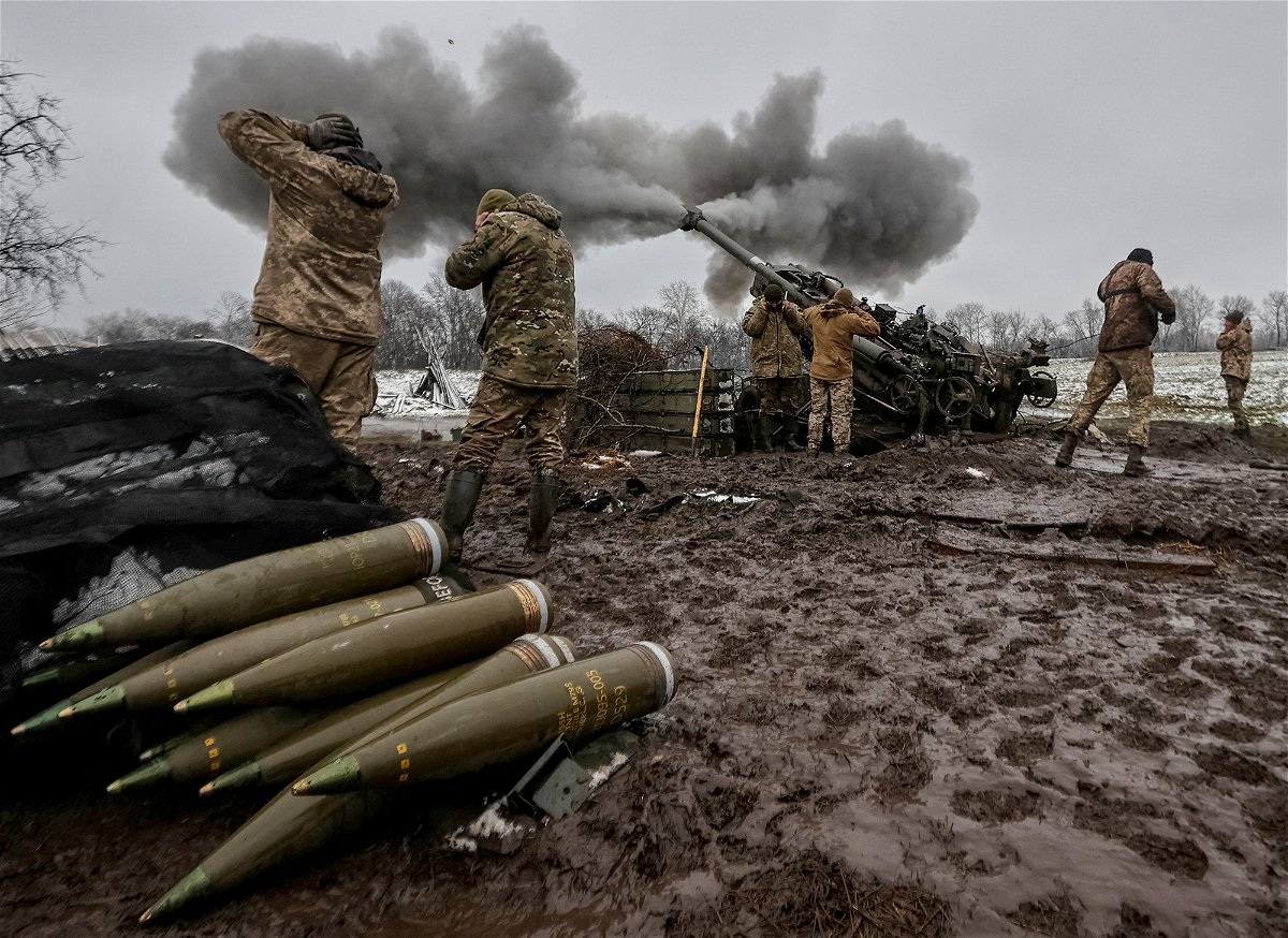 <i>Serhii Nuzhnenko/Radio Free Europe/Reuters</i><br/>The United States has moved US munitions stored in Israel for use in Ukraine. Ukrainian service members fire a shell from an M777 Howitzer at a front line in the Donetsk Region