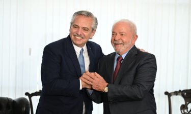 Brazil's President Luiz Inacio Lula da Silva (right) poses for a picture with Argentina's President Alberto Fernandez during a bilateral meeting in Brasilia on January 2.