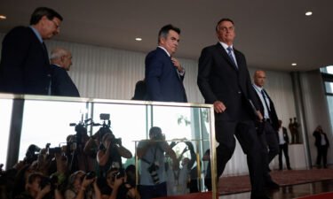 Brazilian police found a draft decree intended to overturn the election result in former President Jair Bolsonaro's justice minister home. Bolsonaro is pictured here in Brasilia on November 1