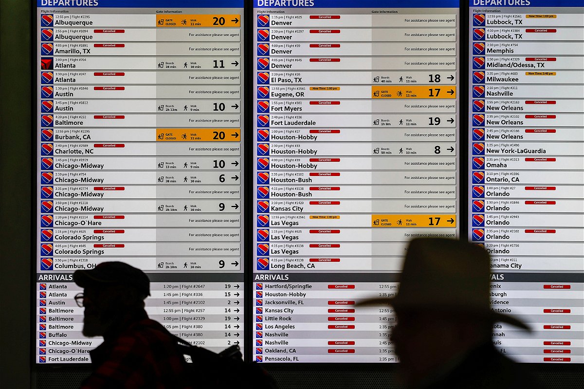 <i>Lola Gomez/AP</i><br/>Canceled Southwest flights are displayed at Dallas Love Field Airport in Dallas on January 30.