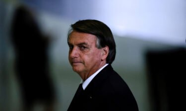 Jair Bolsonaro looks on after a ceremony about the National Policy for Education at the Planalto Palace in Brasilia