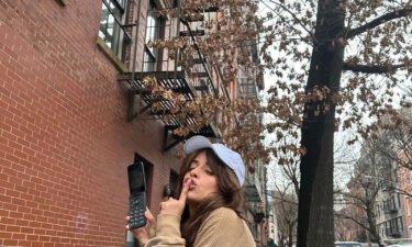 Camila Cabello with her flip phone. "I'm team flip phone revolution