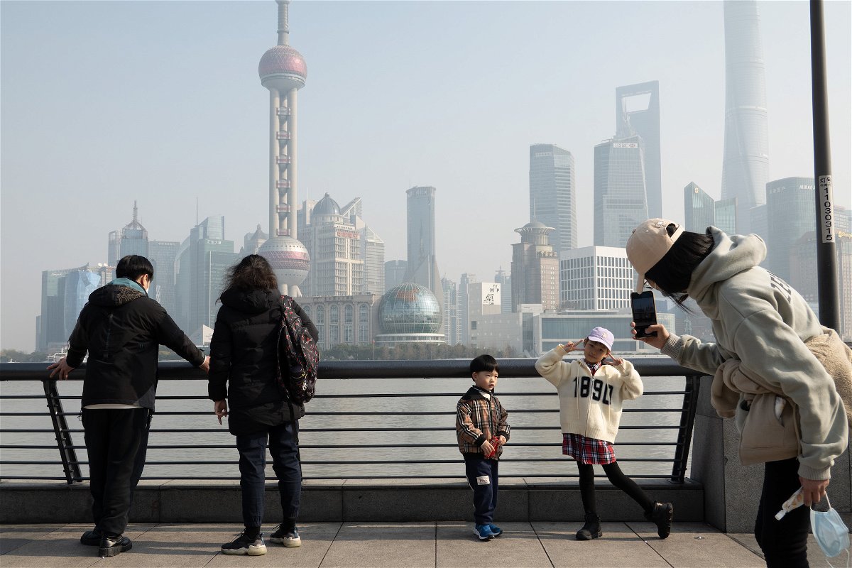 <i>CFOTO/Future Publishing/Getty Images</i><br/>China's local governments have set their 2023 growth targets. Tourists here visit the Bund in Shanghai