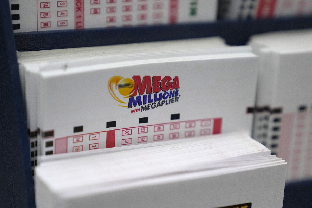 <i>Charles Krupa/AP</i><br/>A display holds Mega Million lottery ticket wagering cards at Ted's State Line Mobil station