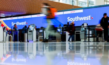 A winter storm in Denver has caused hundreds of flight cancellations at Denver International Airport on Wednesday. Pictured are Southwest Airlines check-in counters at Denver International Airport on December 28