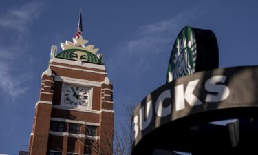 Corporate workers at Starbucks must return to the office at least three days a week by the end of January. Pictured are Starbucks headquarters in Seattle