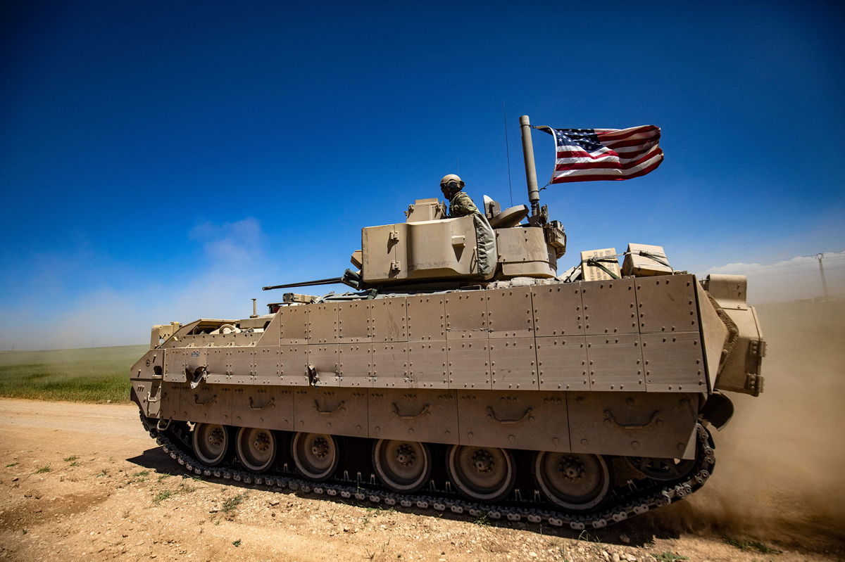 <i>Delil souleiman/AFP/Getty Images</i><br/>A US Bradley fighting vehicle patrols the countryside of the Kurdish-majority city of Qamishli in Syria's northeastern Hasakeh province In April of 2022. The United States will supply Ukraine with Bradley fighting vehicles as part of a new security assistance package to the country.