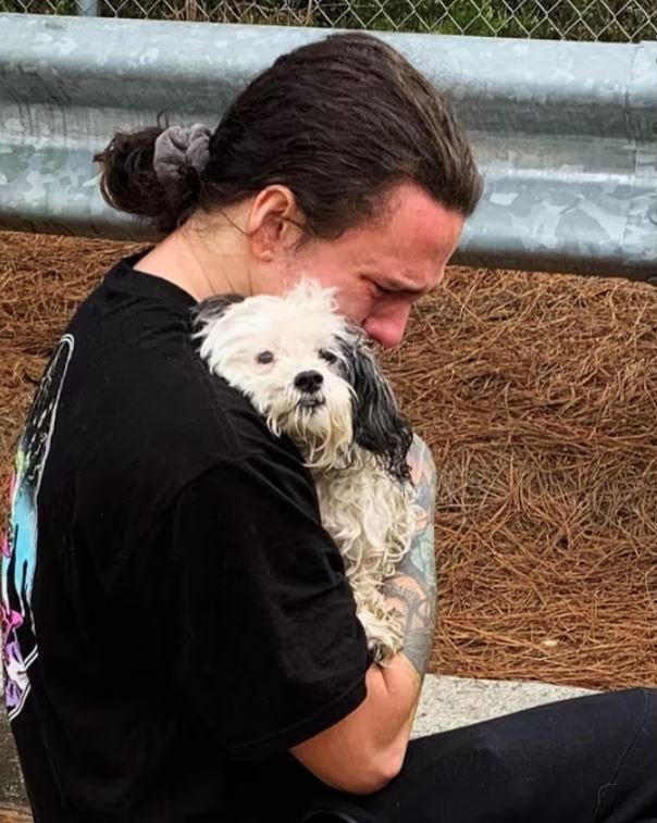 <i>Cobb County Fire & Emergency/WANF</i><br/>Trixie the dog has been reunited with its owner after falling 12 feet down a storm drain.