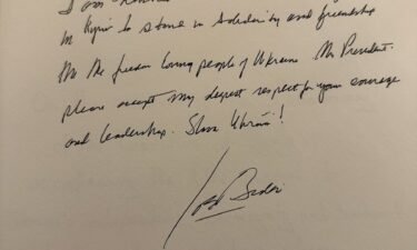 President Joe Biden paid tribute to Ukrainian President Volodymyr Zelensky’s “courage and leadership” in a message written on the guestbook at Mariinsky Palace