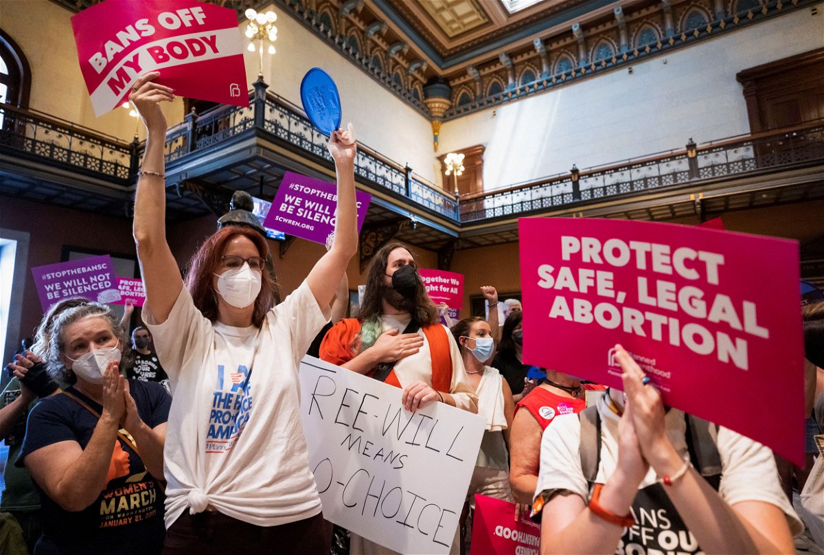 <i>Sam Wolf/Reuters</i><br/>Protesters gather at the South Carolina State House in August 2022 as lawmakers debate a near-total ban on abortion