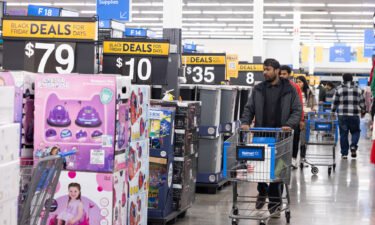 Walmart on Tuesday forecast slower sales and profit growth as inflation takes its toll. Pictured is a Walmart store in Dunwoody