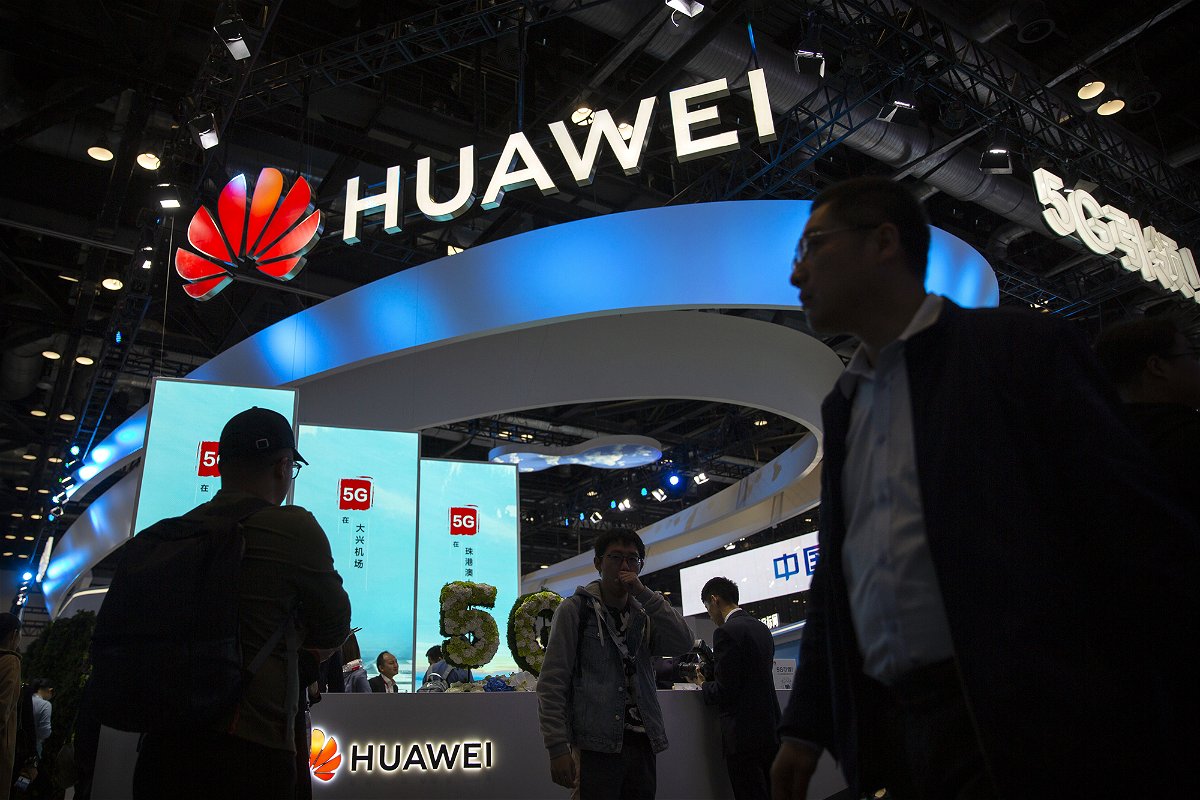 <i>Mark Schiefelbein/AP/FILE</i><br/>The US government is reviewing a policy that permits certain US exports to continue to Huawei. Pictured is a display for 5G services from Chinese technology firm Huawei at the PT Expo in Beijing in 2019.