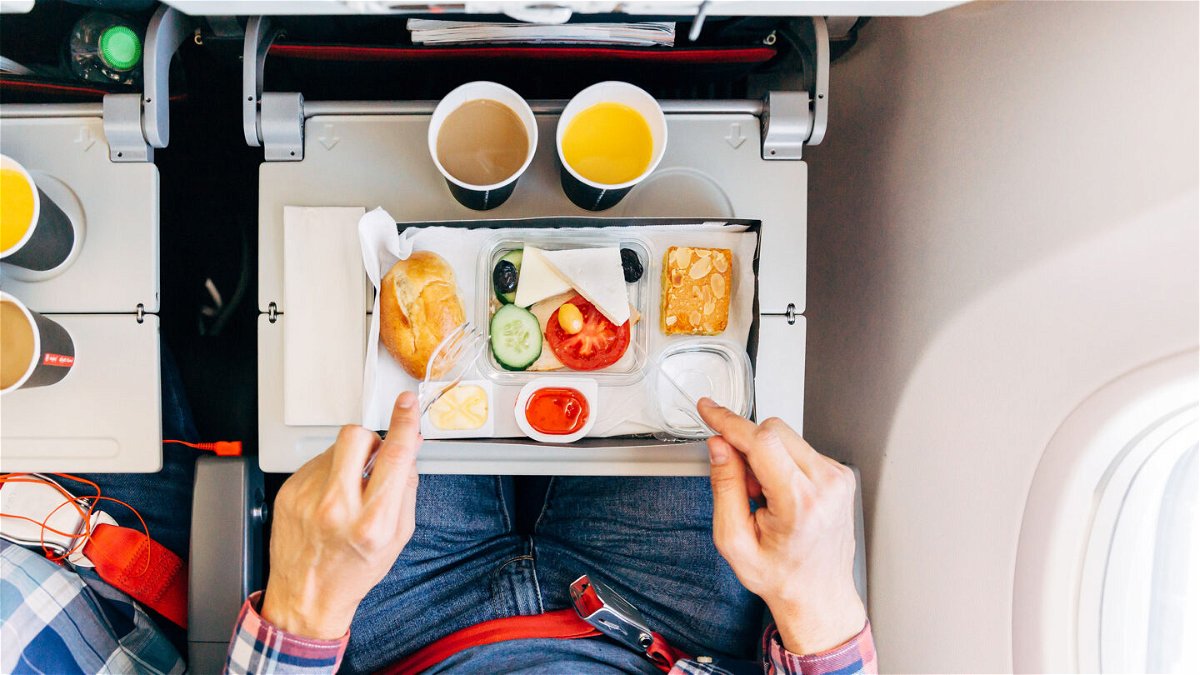 <i>Alexander Spatari/Moment RF/Getty Images</i><br/>Not everyone wants to eat on a flight.