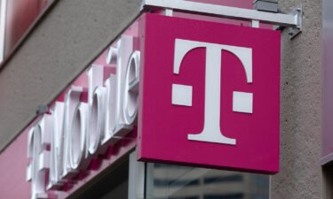 Several US mobile carriers experienced technical difficulties Monday night. The T-Mobile logo is seen on a storefront on October 14