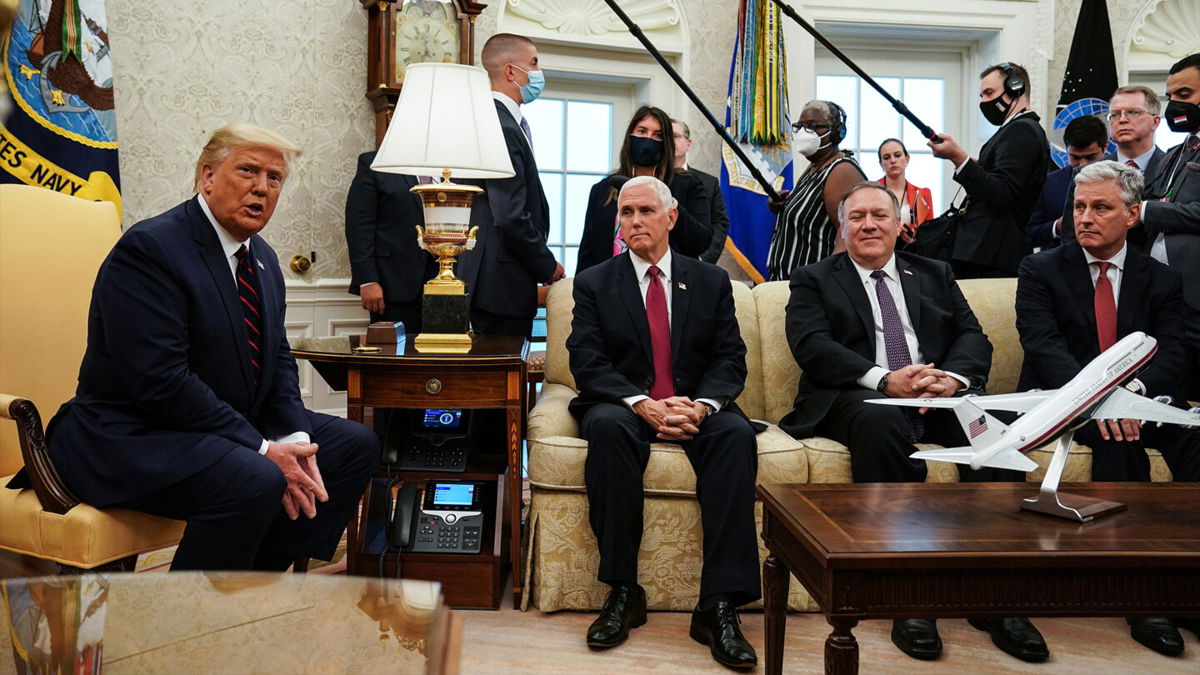 <i>Anna Moneymaker/Pool/Getty Images</i><br/>U.S. President Donald Trump (L) talks to reporters while hosting Iraqi Prime Minister Mustafa Al-Kadhimi and (L-R) Vice President Mike Pence