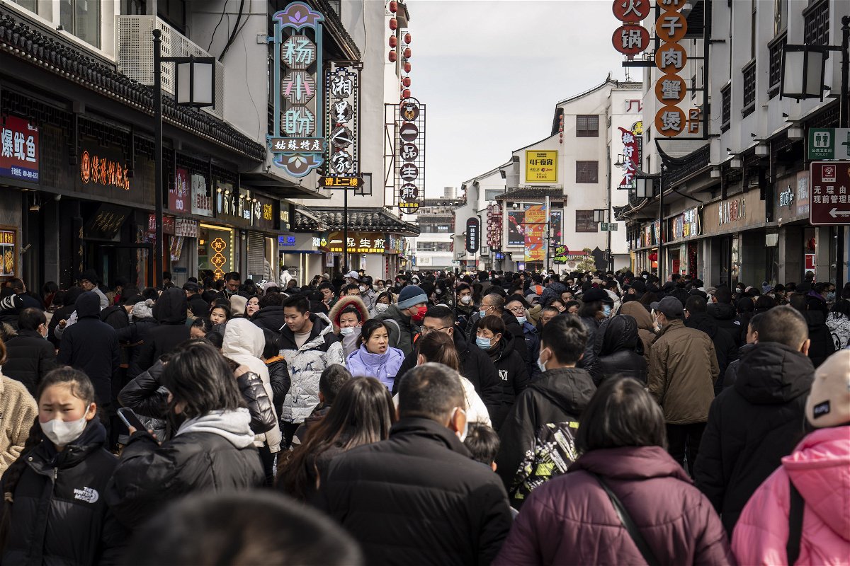 <i>Qilai Shen/Bloomberg/Getty Images</i><br/>Shoppers are pictured here in the Guanqian Street shopping area in Suzhou
