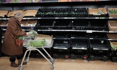 Empty fruit and vegetable shelves at an Asda in east London on February 21. A shortage of tomatoes affecting UK supermarkets is widening to other fruit and vegetables and is likely to last weeks