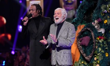 Host Nick Cannon and Dick Van Dyke in the season nine premiere episode of "The Masked Singer."