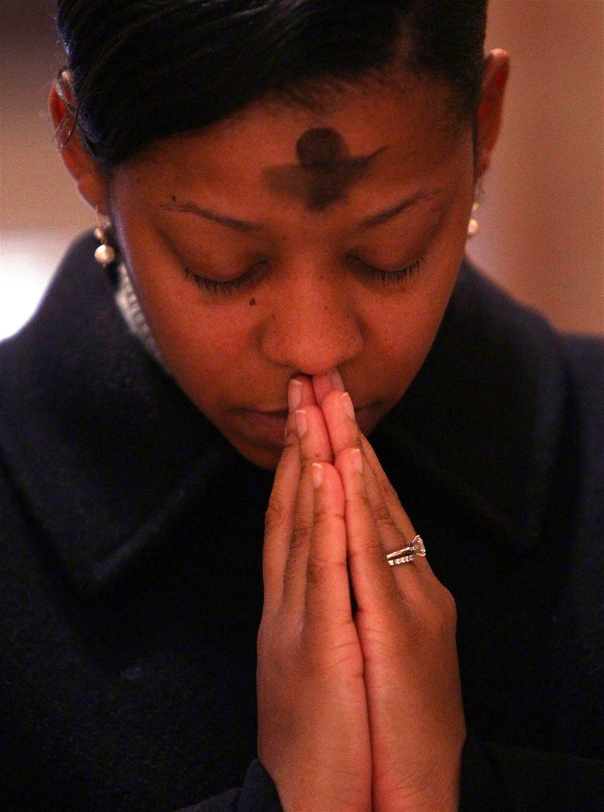 <i>Win McNamee/Getty Images</i><br/>A young woman prays during an Ash Wednesday Mass at the Cathedral of Saint Matthew the Apostle in February of 2010 in Washington