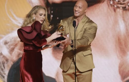 Adele accepts the Best Pop Solo Performance award for "Easy On Me" from Dwayne Johnson.