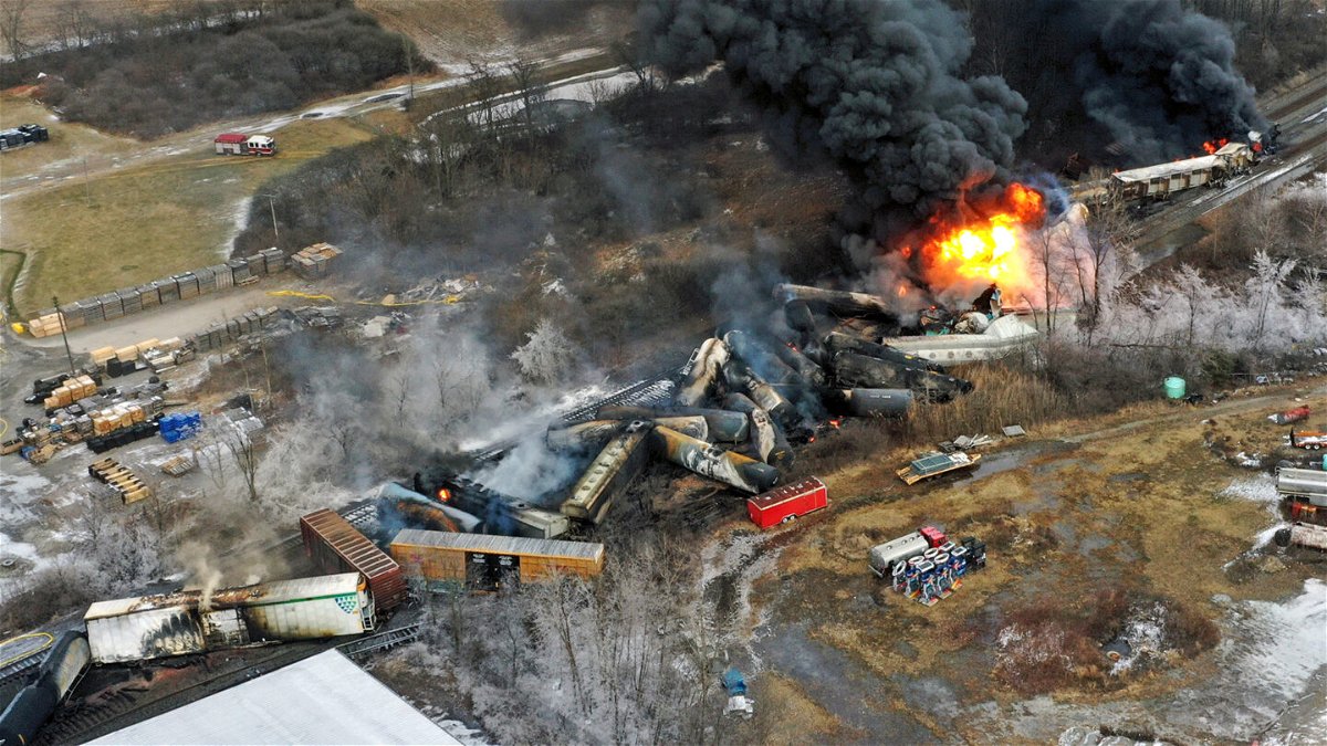 <i>Gene J. Puskar/AP</i><br/>Portions of the Norfolk Southern freight train that derailed are seen in this photo taken a day after the derailment.